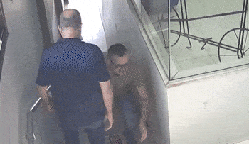Brig. Gen. Hakhrush stepping over the victim.