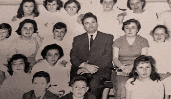 Eliezer Unger pictured with students in an undated photograph from the time he was a principle in a school in Montevideo, Uruguay., Credit: Unger family Eliezer Unger pictured with students in an undated photograph from the time he was a principle in a school in Montevideo, Uruguay.