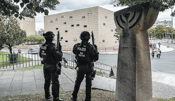 Policemen secure the area close to a synagogue in Dresden, eastern Germany, October 9, 2019. 