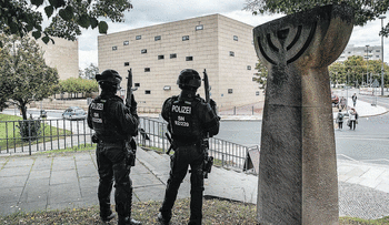 Policemen secure the area close to a synagogue in Dresden, eastern Germany, October 9, 2019. , Credit: Robert Michael / dpa / AFP Policemen secure the area close to a synagogue in Dresden, eastern Germany, October 9, 2019.