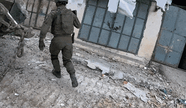 IDF soldiers in combat in Shujaiyeh.