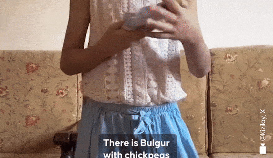 Young Gazan girl creates unboxing video of a humanitarian aid package from Turkey, in Gaza.