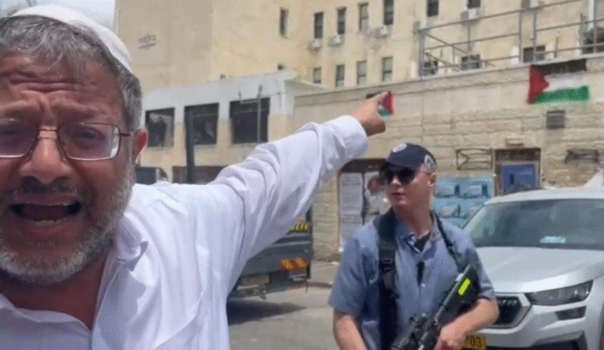 Israel's National Security Minister Itamar Ben-Gvir points at Palestinian flags in central Israel's Beit Shemesh on Thursday.