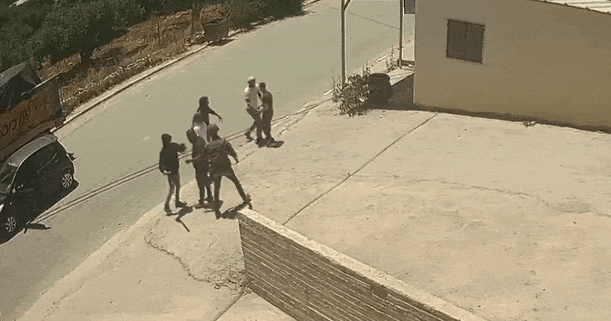 IDF soldier filmed beating Palestinians in settler raid on West Bank town; Eight wounded, medics say